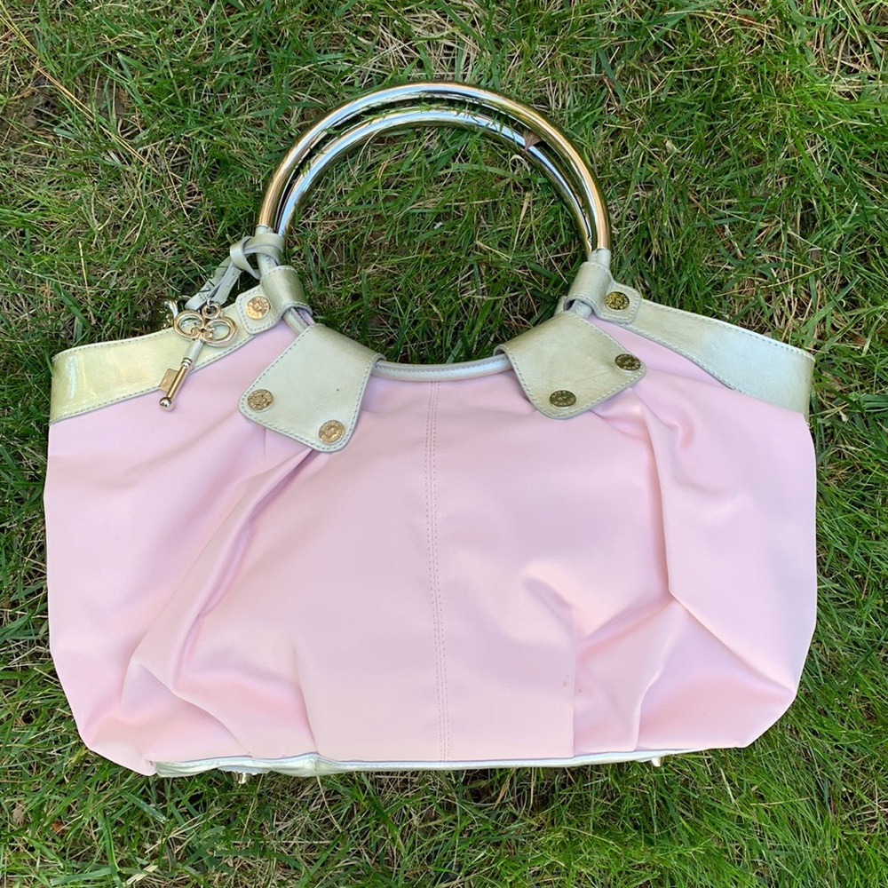 Bobbi by Sharif fancy hobo style handbag with silver hardware and circle grasp